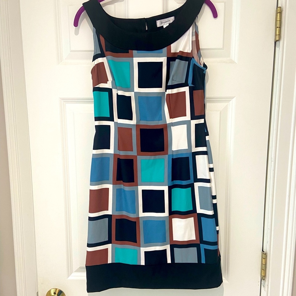 Dress barn dress size 6. Worn once. No flaws.